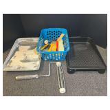 Assorted Painting Supplies Including Brushes, Rollers, and Trays