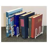 Assorted Book Collection Including Outlander and Reference Guides with Metal Bookend Rack