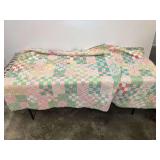 Handmade Patchwork Quilt with Floral and Geometric Patterns