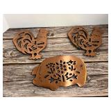 Set of Three Copper-Tone Metal Trivets with Rooster and Pig Motifs