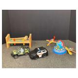 Assorted Toy Lot Including Wooden Pound-A-Bench, Military Jeep, Police SUV, and Globe with Airplanes
