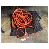 Orange Heavy-Duty Extension Cord with Black Storage Bag