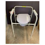 Grey Steel Frame Bedside Commode with Armrests and Plastic Basin