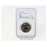 1986-D STATUE OF LIBERTY HALF DOLLAR COIN, NGC GRADED MS69