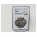 1885-P MORGAN SILVER DOLLAR COIN, NGC GRADED MS63