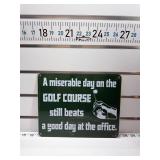 Miserable golf beats good office sign