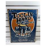 Toolï¿½in hand garage sign