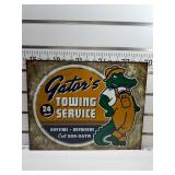 Gators towing service sign