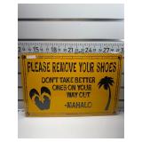 Please remove your shoes sign
