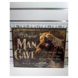 The original man cave sign