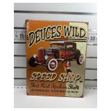 Deuces wild speed shop sign