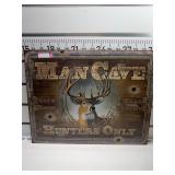 Man cave hunters only sign