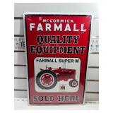 Farmall sold here sign