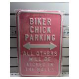 Biker chick parking heavy sign