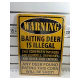 Warning baiting deer is illegal sign