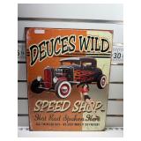 Deuces wild speed shop sign