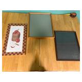 2 empty frames and framed art