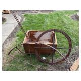 Metal garden decor and wood crate