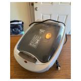 Meat grilling machine