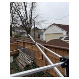 Outdoor umbrella clothesline