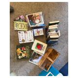 Books, magazines, and wooden basket