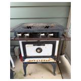 Antique cast-iron top freestanding stove