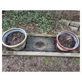 2 planters and welcome mat