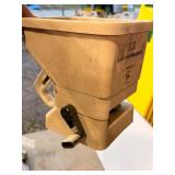 Handheld seed spreader