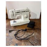 Sewing machine and pedal