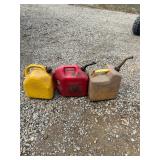 Group of 5 gallon fuel cans