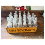 Vintage gem beverages crate and bottles