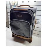 Used Gray carry-on spinner luggage bag