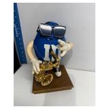 M&M saxophone player candy dispenser