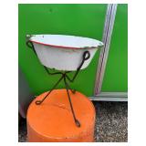 Wrought iron plant stand with enameled pot planter