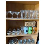 Contents of shelves, wine punch glasses Tupperware
