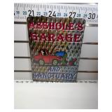 ****ï¿½s garage sign