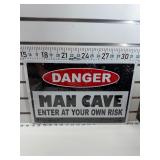 Danger man cave sign