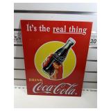 Real thing Coca-Cola sign