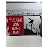 Please use handrail sign