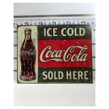 Ice cold Coca Cola sold here sign