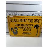 Please remove your shoes sign