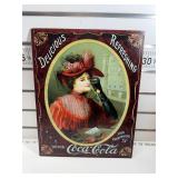 Delicious refreshing Coca-Cola sign