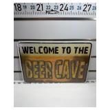 Welcome to the beer Cave sign