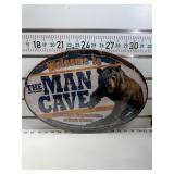 The man cave oval sign