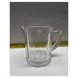 Paneled glass cream pitcher