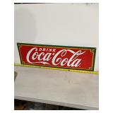 Coca-Cola embossed metal sign