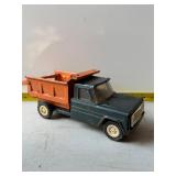 Pressed steel toy dump truck