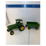 Diecast metal John Deere tractor with trailer