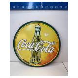 Round Coca Cola sign