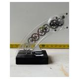 Moving gear clock
